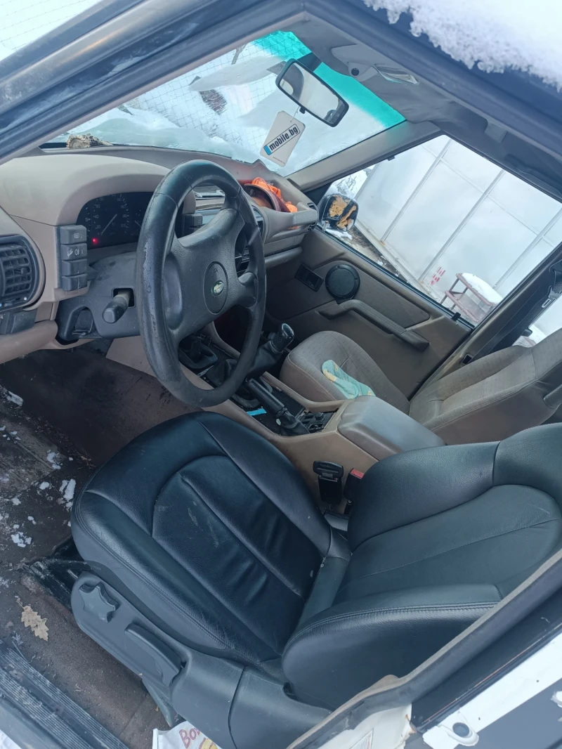 Land Rover Discovery 2.5, снимка 9 - Автомобили и джипове - 48704645