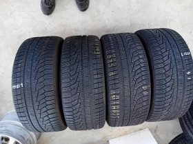 Гуми Зимни 245/45R18, снимка 1 - Гуми и джанти - 47139981