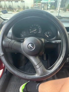 Opel Corsa 1.2i 65HP, снимка 6