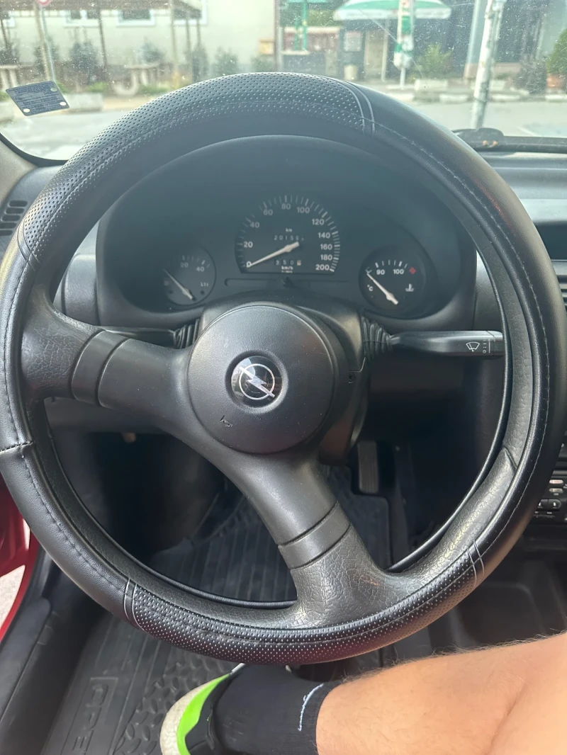 Opel Corsa 1.2i 65HP, снимка 6 - Автомобили и джипове - 47355340