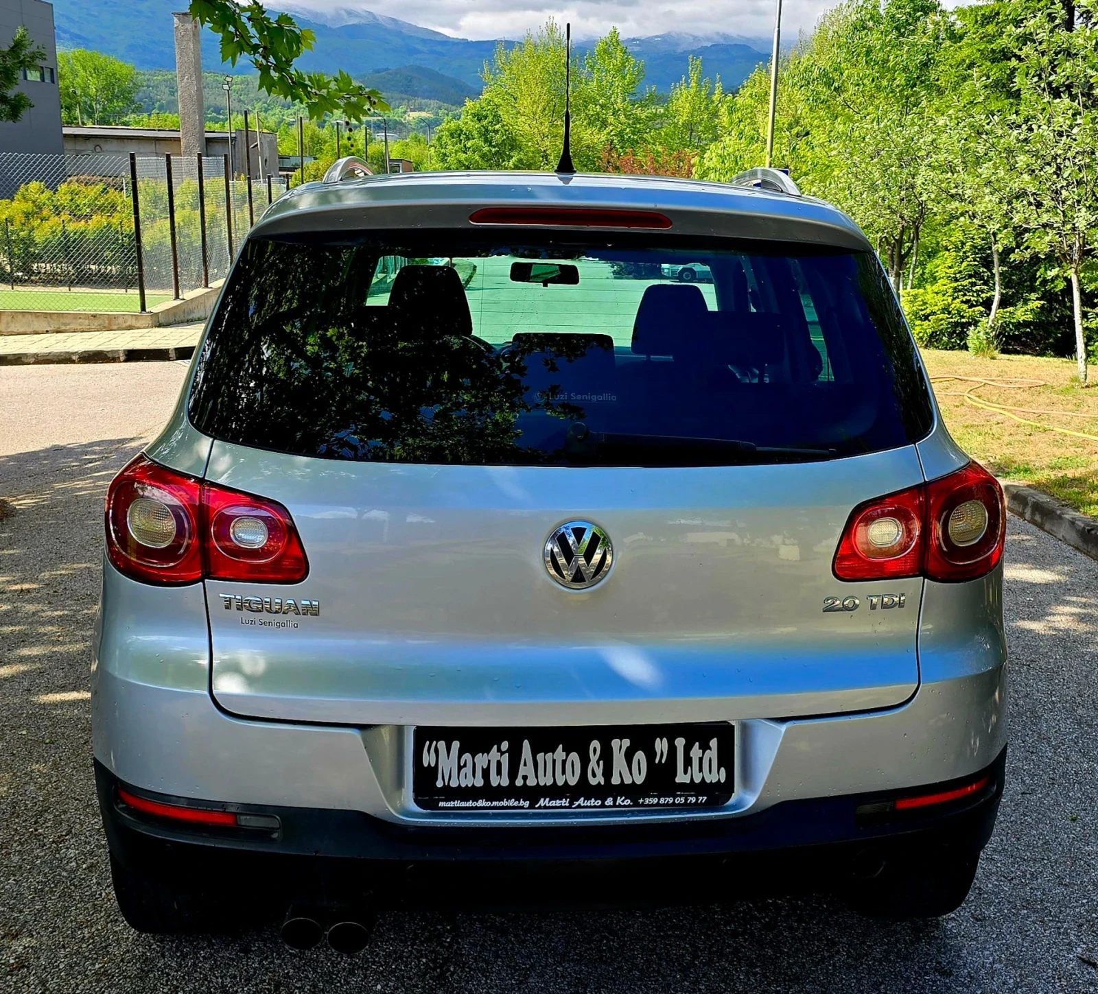 VW Tiguan 2.0 TDI 4 Motion DSG Park Assist , снимка 8 - Автомобили и джипове - 52406701