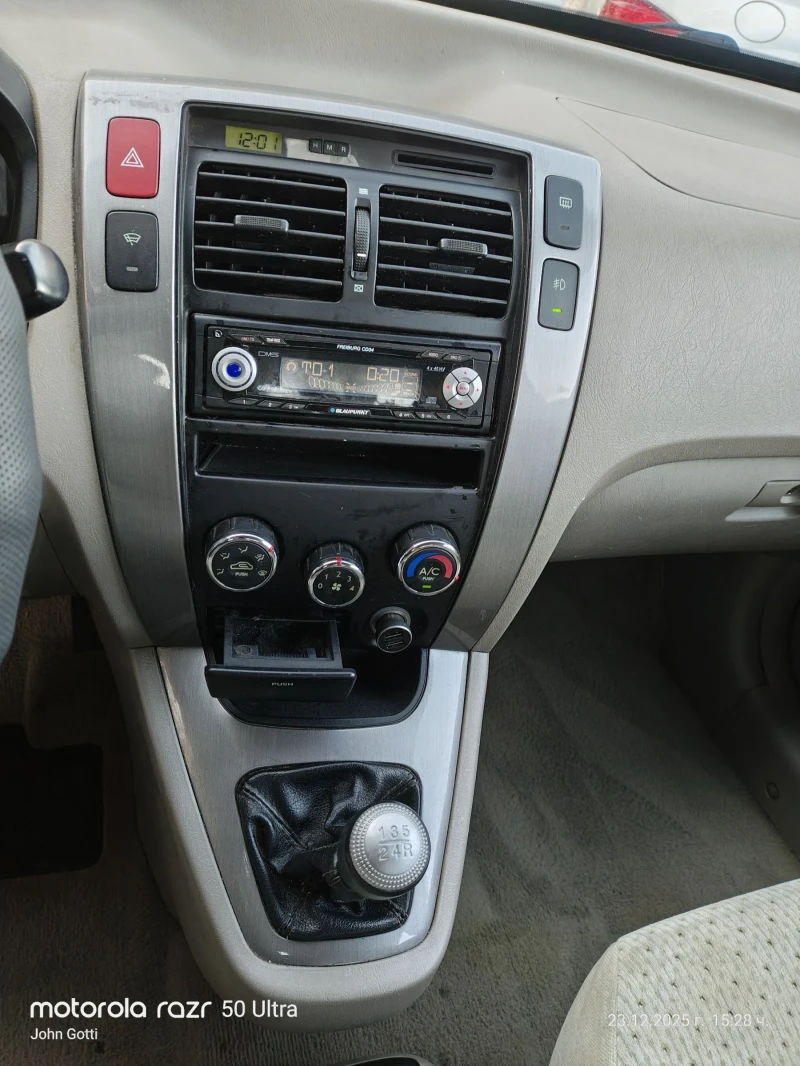 Hyundai Tucson 2.0 CRDi 116k.c. klimatik , снимка 12 - Автомобили и джипове - 52889557