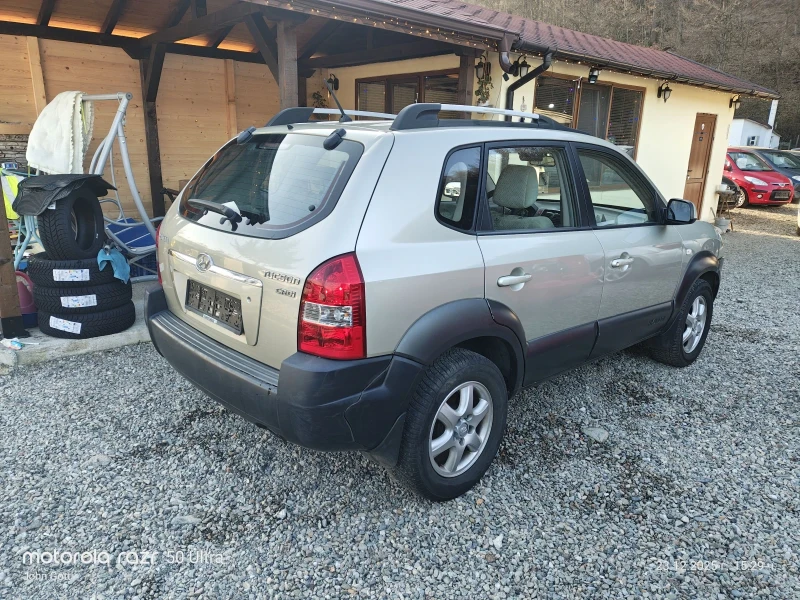 Hyundai Tucson 2.0 CRDi 116k.c. klimatik , снимка 4 - Автомобили и джипове - 52889557