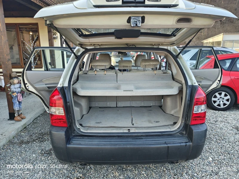 Hyundai Tucson 2.0 CRDi 116k.c. klimatik , снимка 13 - Автомобили и джипове - 52889557