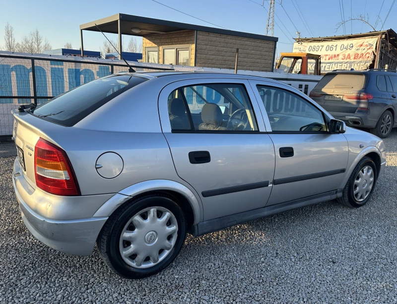 Opel Astra 1.6i 101к.с./КЛИМА/5вр., снимка 4 - Автомобили и джипове - 49224685