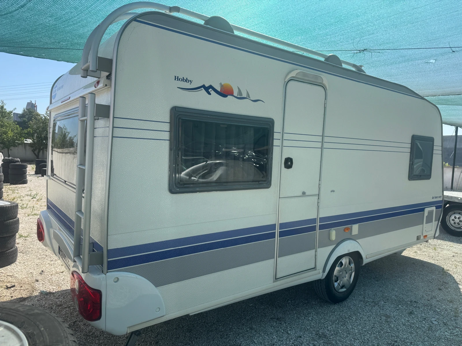 Каравана Hobby  DE LUXE UFE 460
