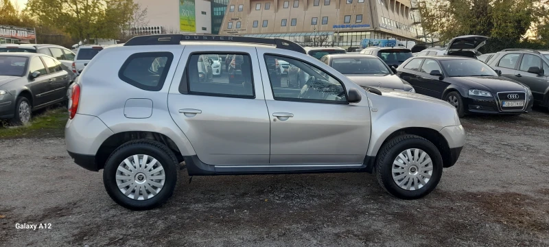 Dacia Duster 1.6i 105kc.4×4., снимка 8 - Автомобили и джипове - 52405064