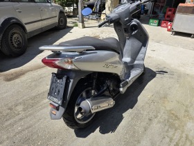 Honda Dylan, снимка 3 - Мотоциклети и мототехника - 45483200