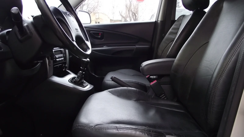 Hyundai Tucson 2.0.d.140.k.c.6.speed.КОЖА., снимка 13 - Автомобили и джипове - 53094539