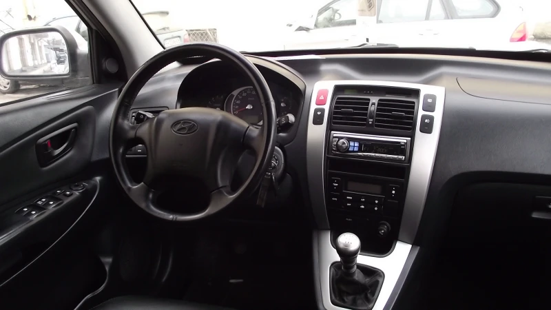 Hyundai Tucson 2.0.d.140.k.c.6.speed.КОЖА., снимка 10 - Автомобили и джипове - 53094539