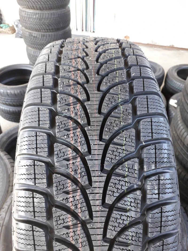 Гуми Зимни 215/70R16, снимка 4 - Гуми и джанти - 45863709