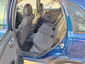 Opel Corsa 1.0i klima , снимка 11 - Автомобили и джипове - 45022477