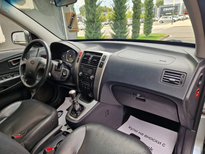 Hyundai Tucson 2.0 / 136 к.с., снимка 8 - Автомобили и джипове - 51488092