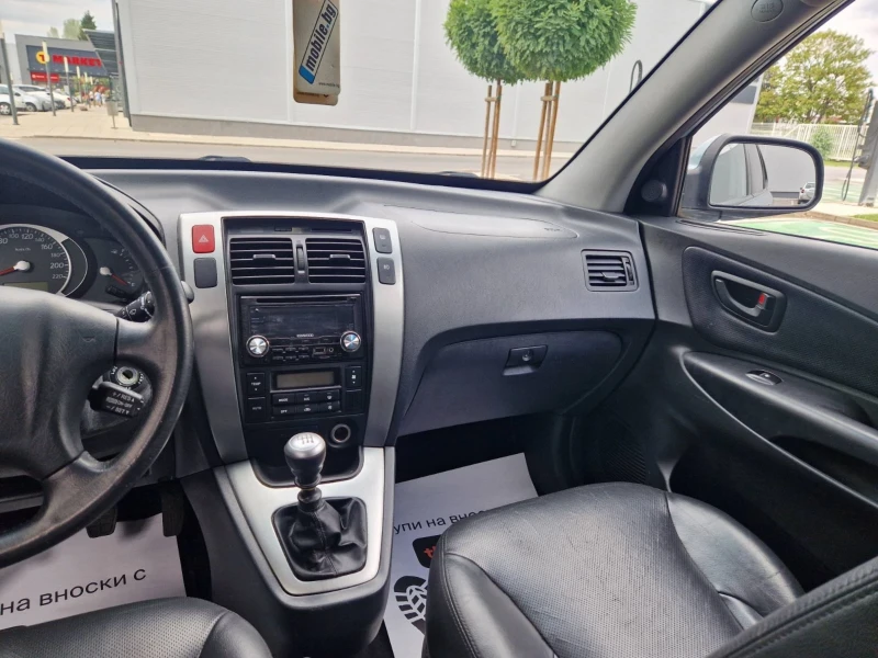 Hyundai Tucson 2.0 / 136 к.с., снимка 13 - Автомобили и джипове - 51488092