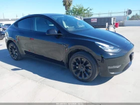 ������ Tesla Model Y