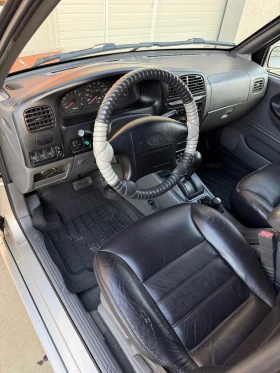 Kia Sportage 2.0 (128 кс), снимка 8