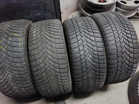 Гуми Зимни 235/45R18, снимка 1 - Гуми и джанти - 39126001