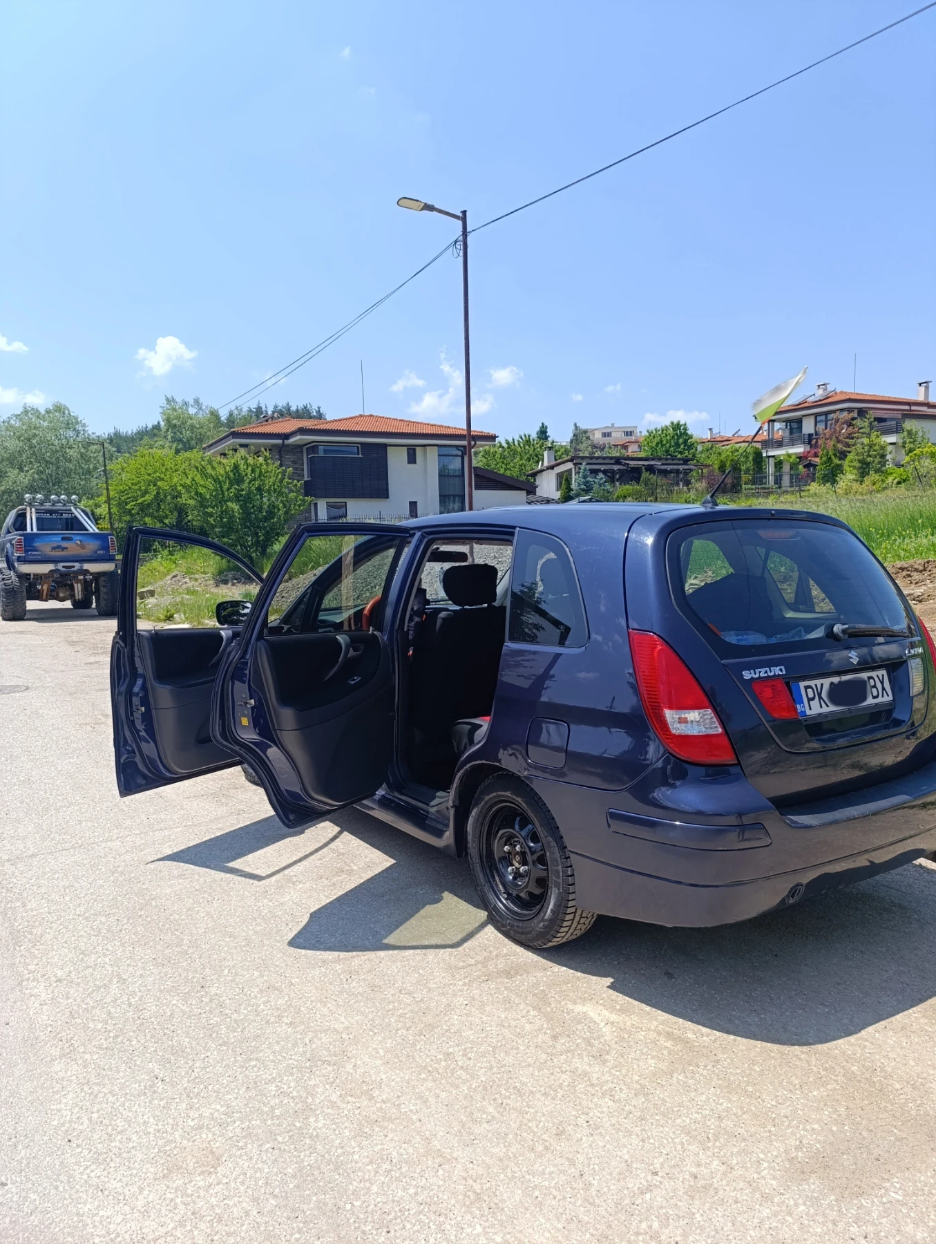 Suzuki Liana, снимка 4 - Автомобили и джипове - 55235344
