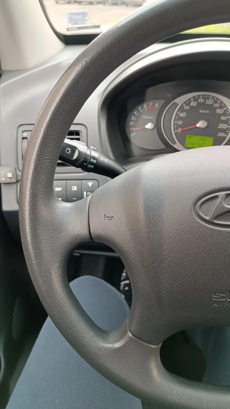 Hyundai Tucson 2.0 i LPG 4x4, снимка 13 - Автомобили и джипове - 49012203