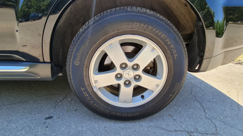 Mitsubishi Outlander 4x4, 7 места, снимка 12 - Автомобили и джипове - 52594410