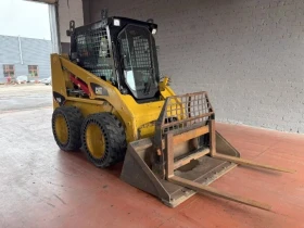 Мини челни товарачи Cat 216B 