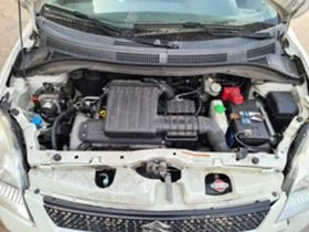 Suzuki Swift 1.3 4x4, снимка 8