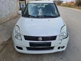 Suzuki Swift 1.3 4x4, снимка 1
