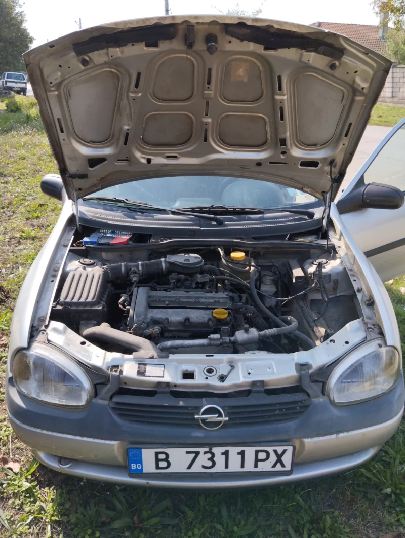 Opel Corsa 1.2i 16V, снимка 6 - Автомобили и джипове - 47911554