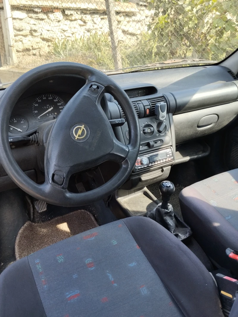 Opel Corsa 1.2i 16V, снимка 5 - Автомобили и джипове - 47911554