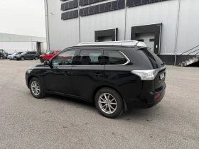 Mitsubishi Outlander 2.0  Plug-in Hybrid/ 4X4/ КАМЕРА/ ДИСТРОНИК  - 19000 лв. / 9714.55 € - 55494983 3