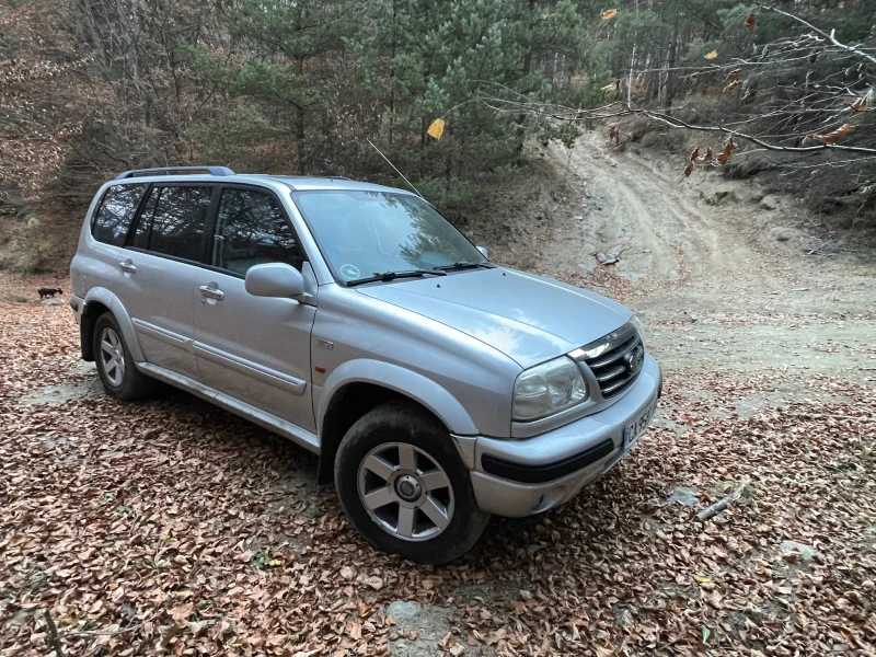 Suzuki Grand vitara XL-7-2.7i V6 НАВИ АВТОМАТ КОЖА, снимка 2 - Автомобили и джипове - 47666590