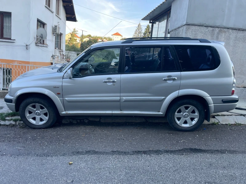 Suzuki Grand vitara XL-7-2.7i V6 НАВИ АВТОМАТ КОЖА, снимка 3 - Автомобили и джипове - 47666590