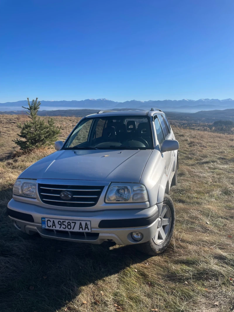 Suzuki Grand vitara XL-7-2.7i V6 НАВИ АВТОМАТ КОЖА, снимка 2 - Автомобили и джипове - 47666590