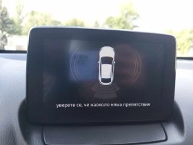 Mazda 2 1, 5i 90ps 67000km!!!, снимка 11