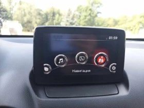 Mazda 2 1, 5i 90ps 67000km!!!, снимка 10