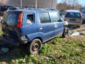 Subaru G3x justy 1.3i 4x4, снимка 12