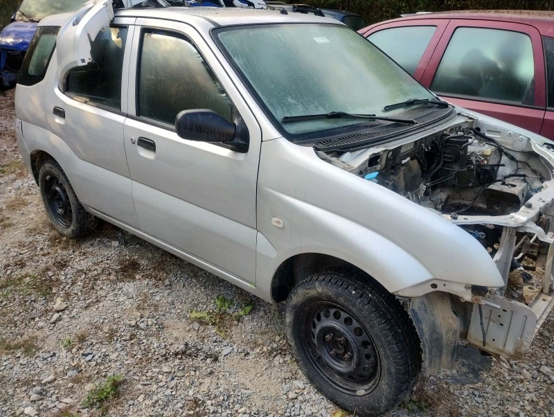 Subaru G3x justy 1.3i 4x4, снимка 9 - Автомобили и джипове - 35681404