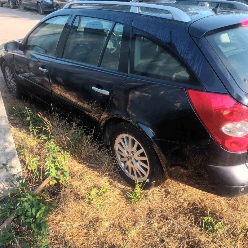 Renault Laguna 2.0 dci, снимка 7 - Автомобили и джипове - 51270094