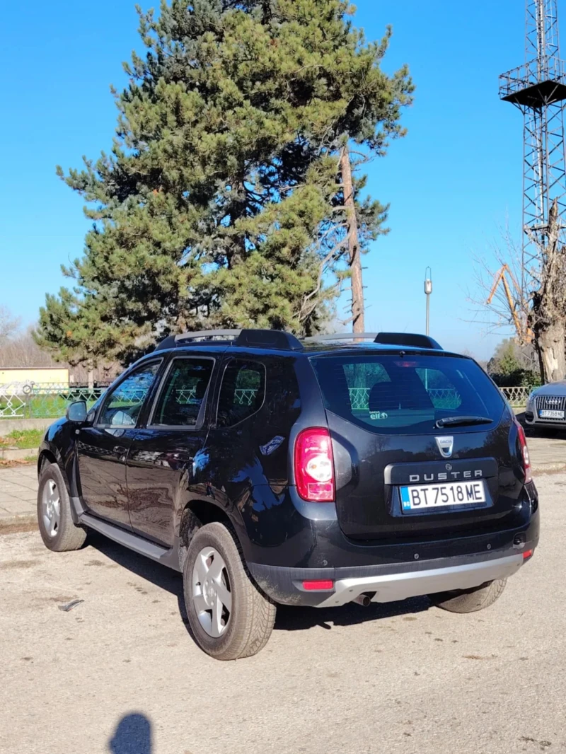 Dacia Duster 1.6 i 110 коня, снимка 15 - Автомобили и джипове - 52598100