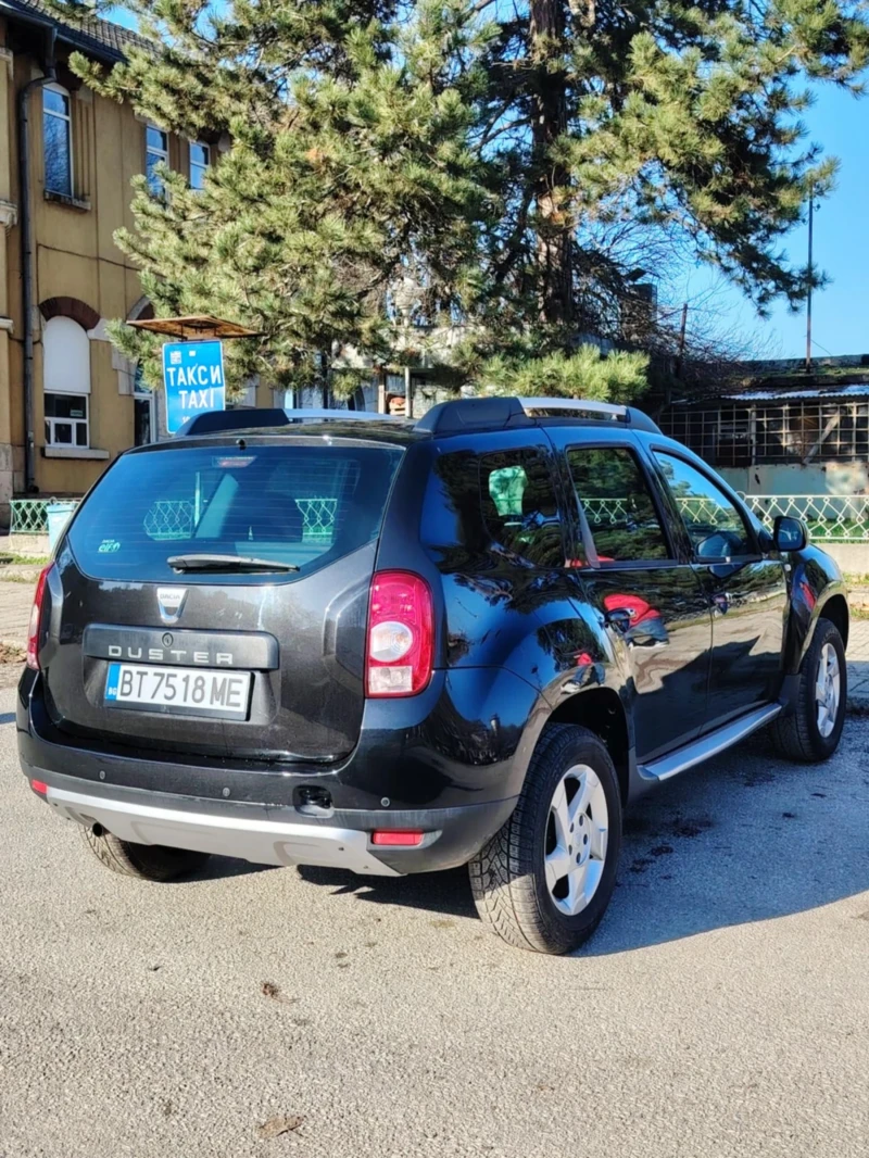 Dacia Duster 1.6 i 110 коня, снимка 13 - Автомобили и джипове - 52598100