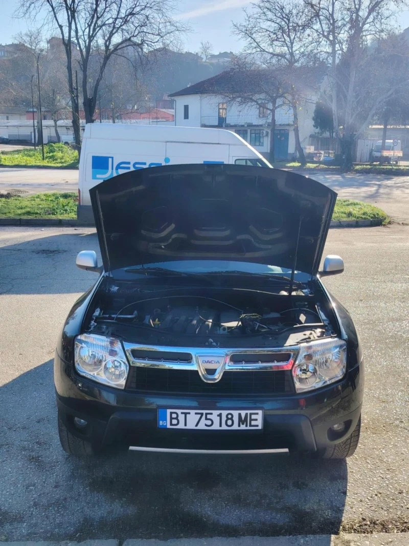Dacia Duster 1.6 i 110 коня, снимка 12 - Автомобили и джипове - 52598100