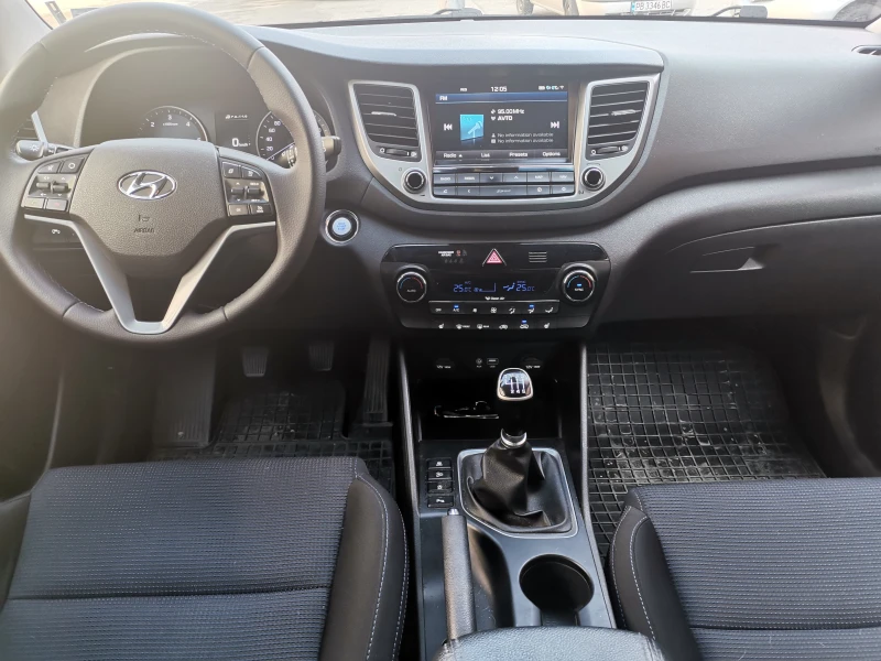 Hyundai Tucson 1.7 CRDI-Xpossible, снимка 14 - Автомобили и джипове - 49543375