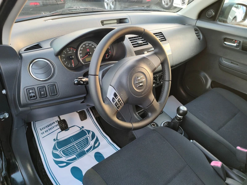 Suzuki Swift 1.3 I.  4x4 , снимка 8 - Автомобили и джипове - 42946672