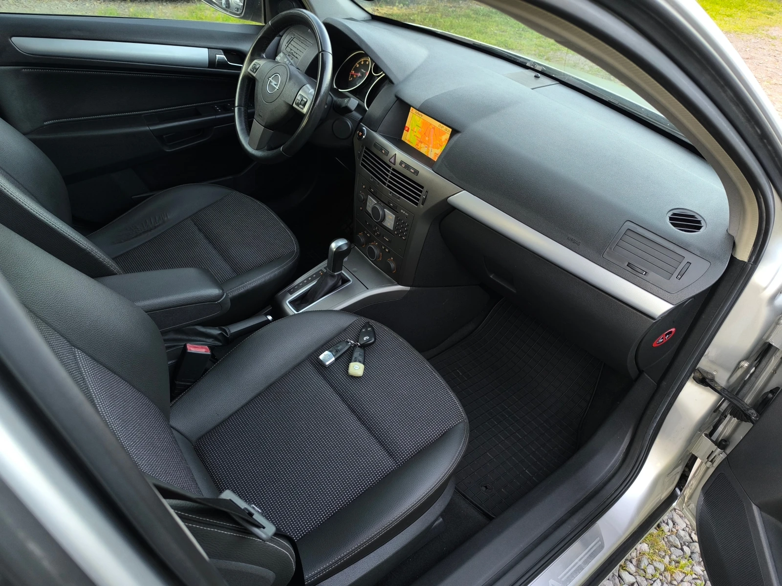 Opel Astra -FACE-1.8i-140кс-АВТОМАТИК-НАВИГАЦИЯ-КОЖА-КЛИМА-, снимка 14 - Автомобили и джипове - 54708359