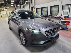 Mazda CX-9 * GS-L * * 7-МЕСТНА* * ПАНОРАМА* * ЗАДНА КАМЕРА*  - 15450 € / 30217.57 лв. - 99917308 2