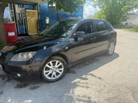 Mazda 3, снимка 1
