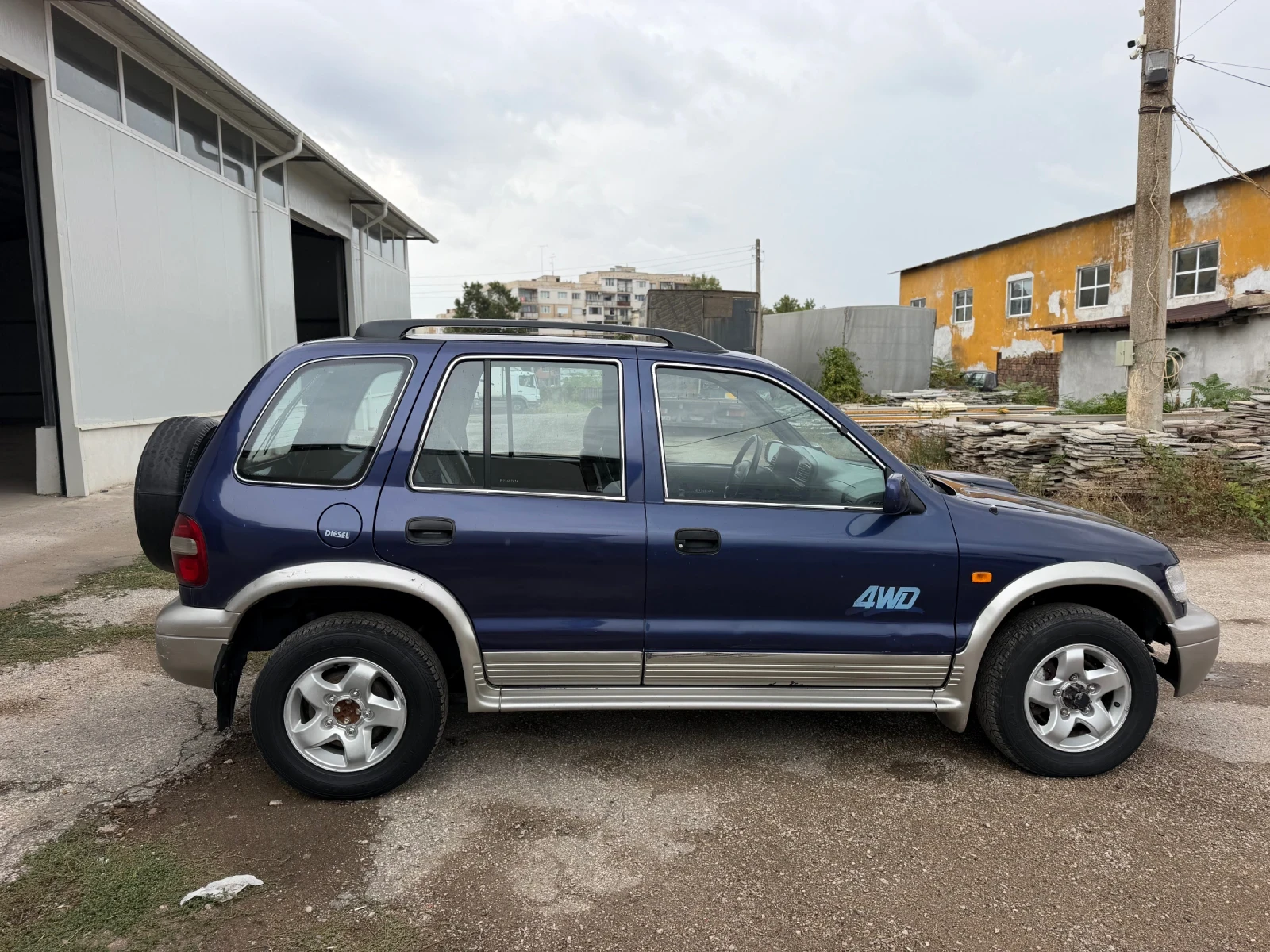 Kia Sportage 2.0TD, снимка 6 - Автомобили и джипове - 56261356