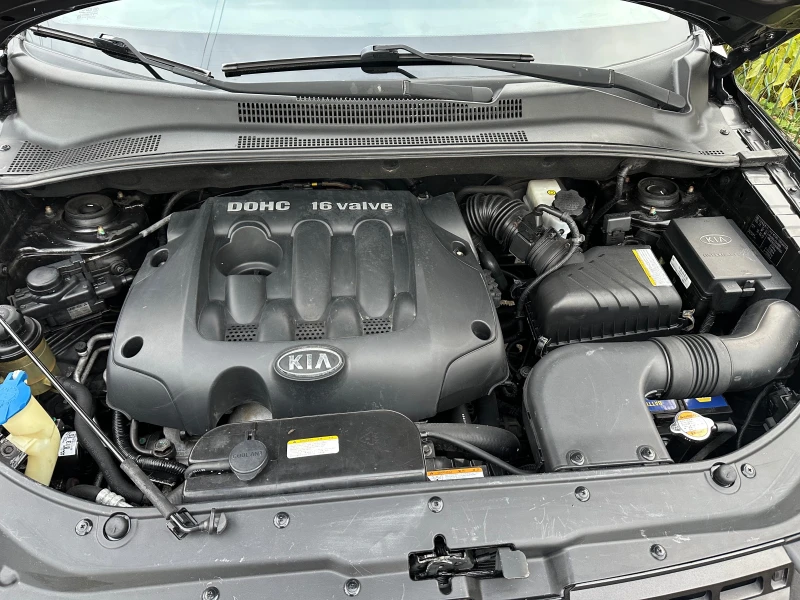 Kia Sportage 2.0i 4x4, снимка 15 - Автомобили и джипове - 52643665