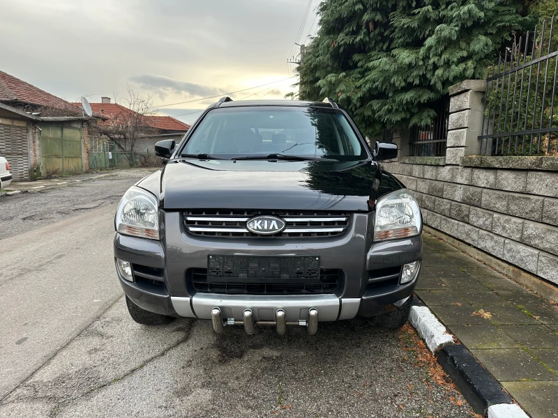 Kia Sportage 2.0i 4x4, снимка 8 - Автомобили и джипове - 52643665