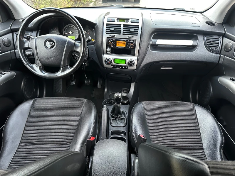Kia Sportage 2.0i 4x4, снимка 14 - Автомобили и джипове - 52643665